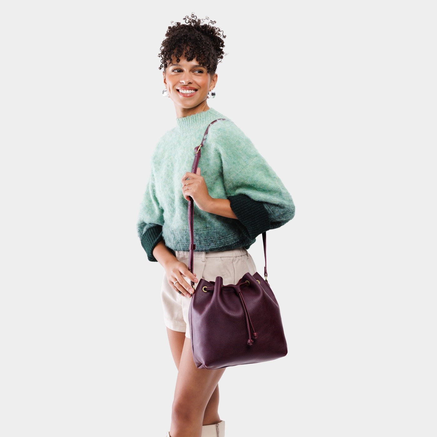 Plum*Large | Model wearing slouchy crossbody bag with drawstring closure