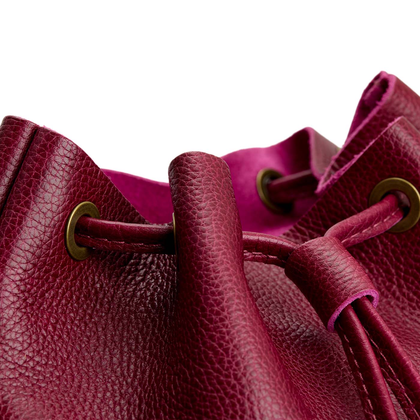 Orchid | Close-up of slouchy crossbody bag with leather drawstring closure