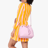 Pinkaboo Large | Model wearing slouchy crossbody bag with drawstring closure