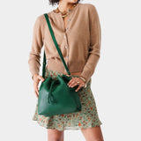 Bacalar Large | Model holding slouchy crossbody bag with drawstring closure