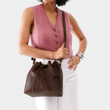 Coldbrew Large | Model wearing slouchy crossbody bag with drawstring closure