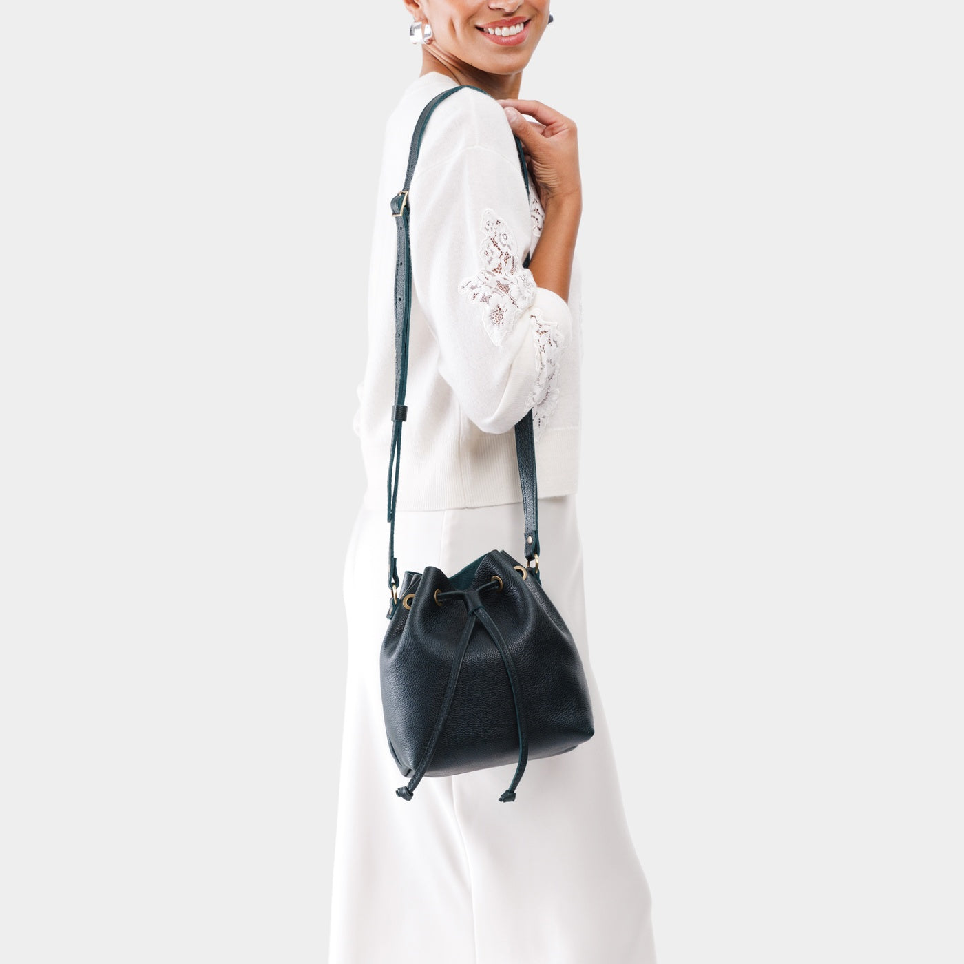 Boreal*Small | Model wearing slouchy crossbody bag with drawstring closure