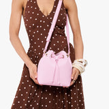 PInkaboo Small | Model wearing slouchy crossbody bag with drawstring closure