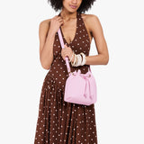 Pinkaboo Small | Model wearing slouchy crossbody bag with drawstring closure