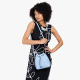 Skyway Small | Model wearing slouchy crossbody bag with drawstring closure