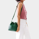 Bacalar Small | Model wearing slouchy crossbody bag with drawstring closure