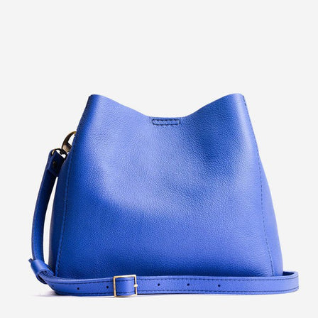 Astro Blue | symmetrical bucket bag with latch closure and removable crossbody strap