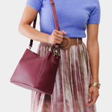 Orchid | symmetrical bucket bag with latch closure and removable crossbody strap