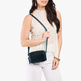 Boreal Small | Model wearing petite rectangular crossbody with adjustable strap