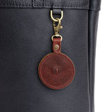 Nutmeg | Heart-shaped airtag holder keychain with a swivel lobster clasp on bag