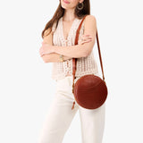 Nutmeg Large | Circle shaped crossbody bag with top zipper