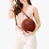 Nutmeg Large | Circle shaped crossbody bag with top zipper