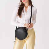 Circle shaped crossbody bag with top zipper