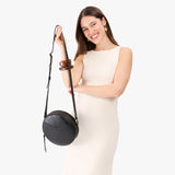 Pebbled--black Large | Circle shaped crossbody bag with top zipper