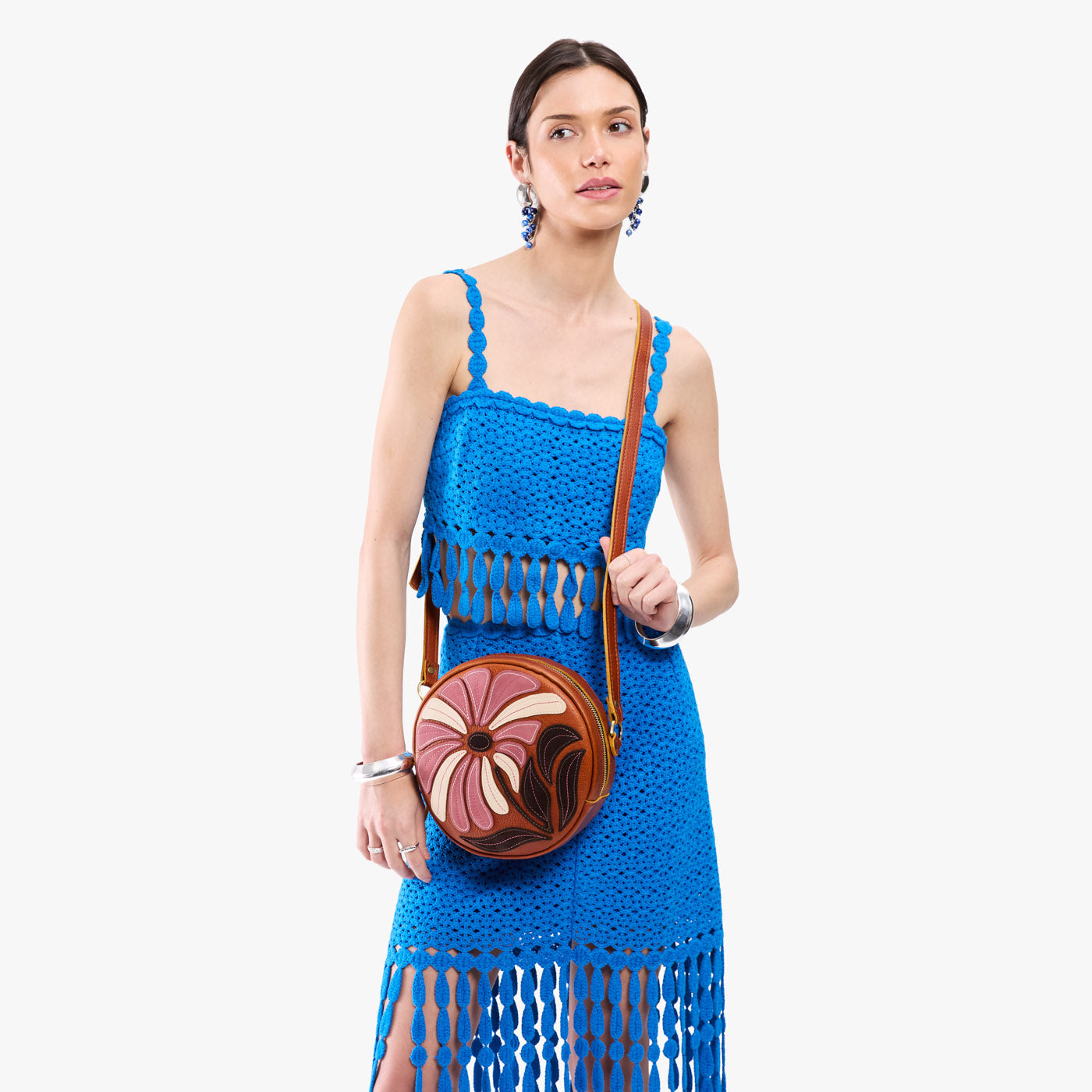 Wildflower Sienna*Large | Model wearing circle shaped crossbody bag with top zipper