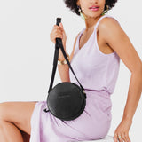 Black Small | Circle shaped crossbody bag with top zipper