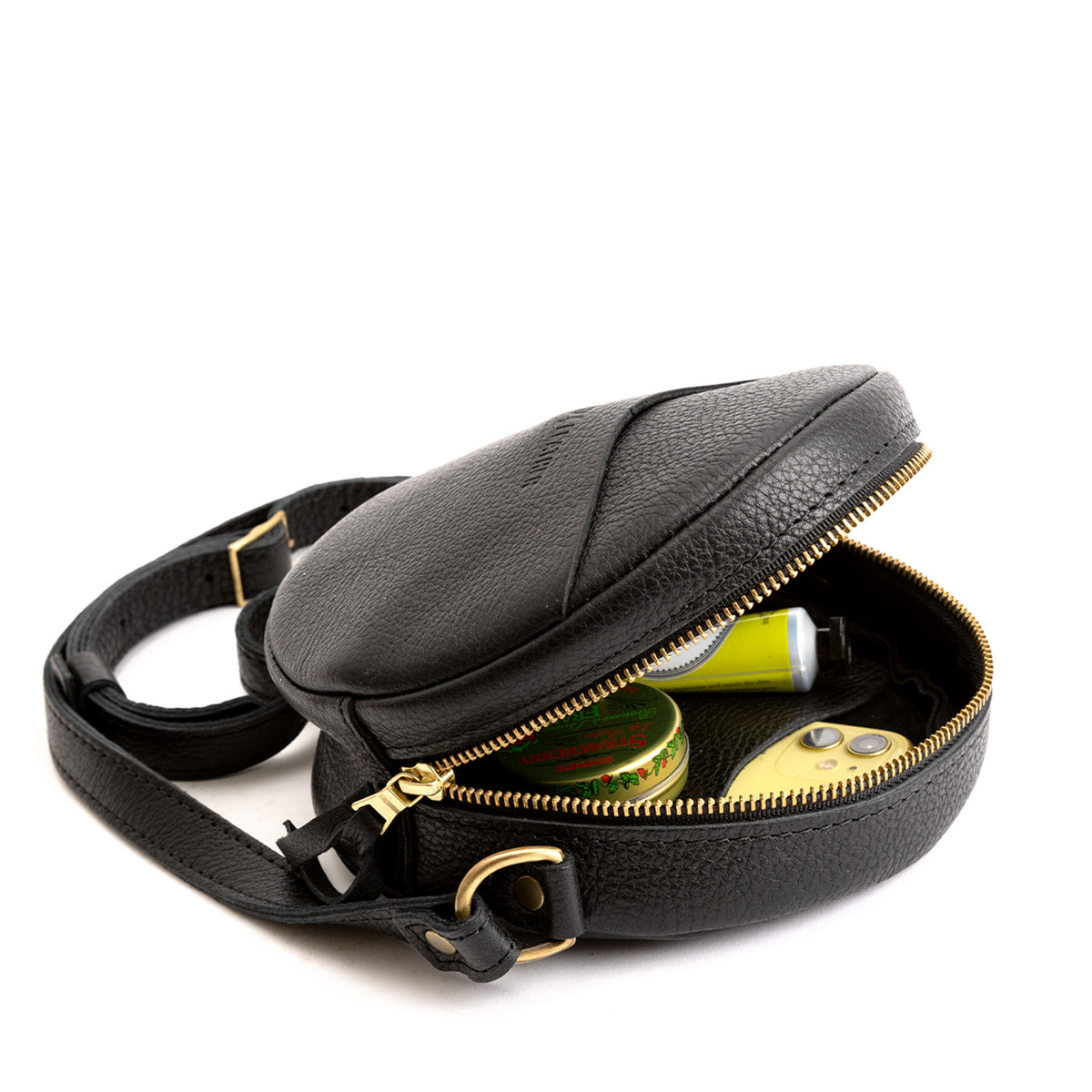 Sm Circle Crossbody Mystery | Close up of Circle Crossbody Bag with zipper open