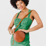 Circle shaped crossbody bag with top zipper