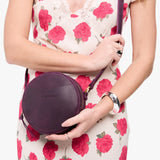 Larkspur Small | Circle shaped crossbody bag with top zipper
