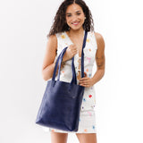 Cobalt | Model with medium Tote with dual shoulder straps and crossbody strap
