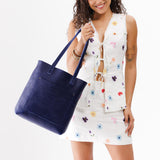 Cobalt | Model with medium Tote with dual shoulder straps and crossbody strap