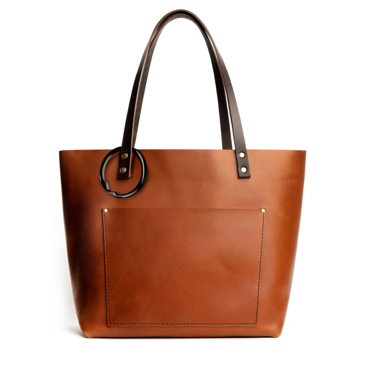 Gunmetal | Circular metal purse hanger clipped onto a bag