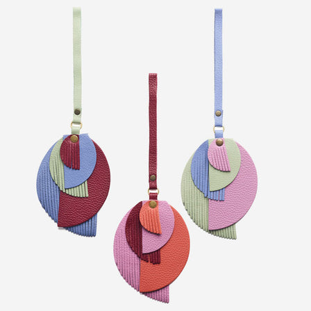 Obsession | Intricately cut leather shapes and fringe