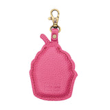 Wild Rose | Back of a cupcake-shaped leather keychain charm with cream-colored frosting, a red cherry on top