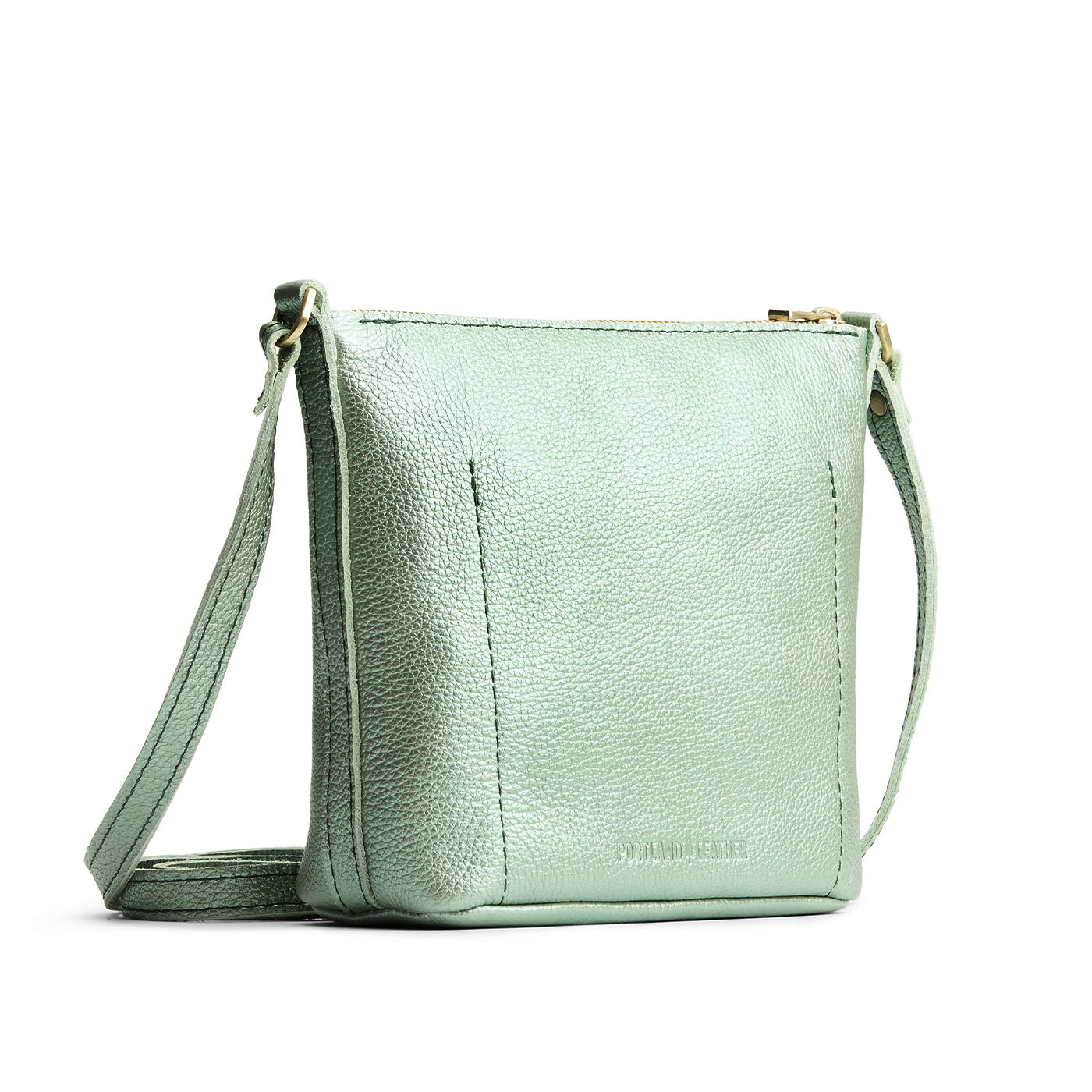 Beetle | Rectangular side bag with curved front pocket and metal tree shaped badge