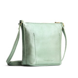 Beetle | Rectangular side bag with curved front pocket and metal tree shaped badge