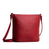 Chili Red | Rectangular side bag with curved front pocket and metal tree shaped badge