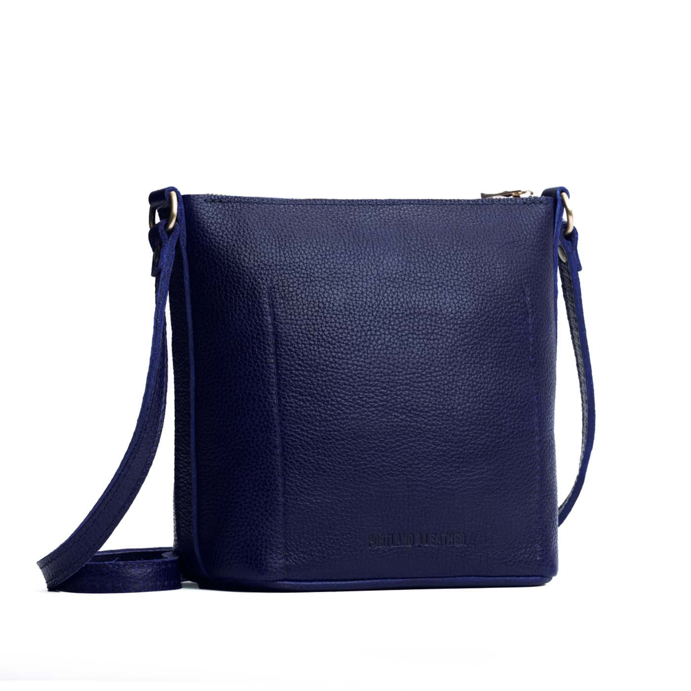 Cobalt | Rectangular side bag with curved front pocket and metal tree shaped badge