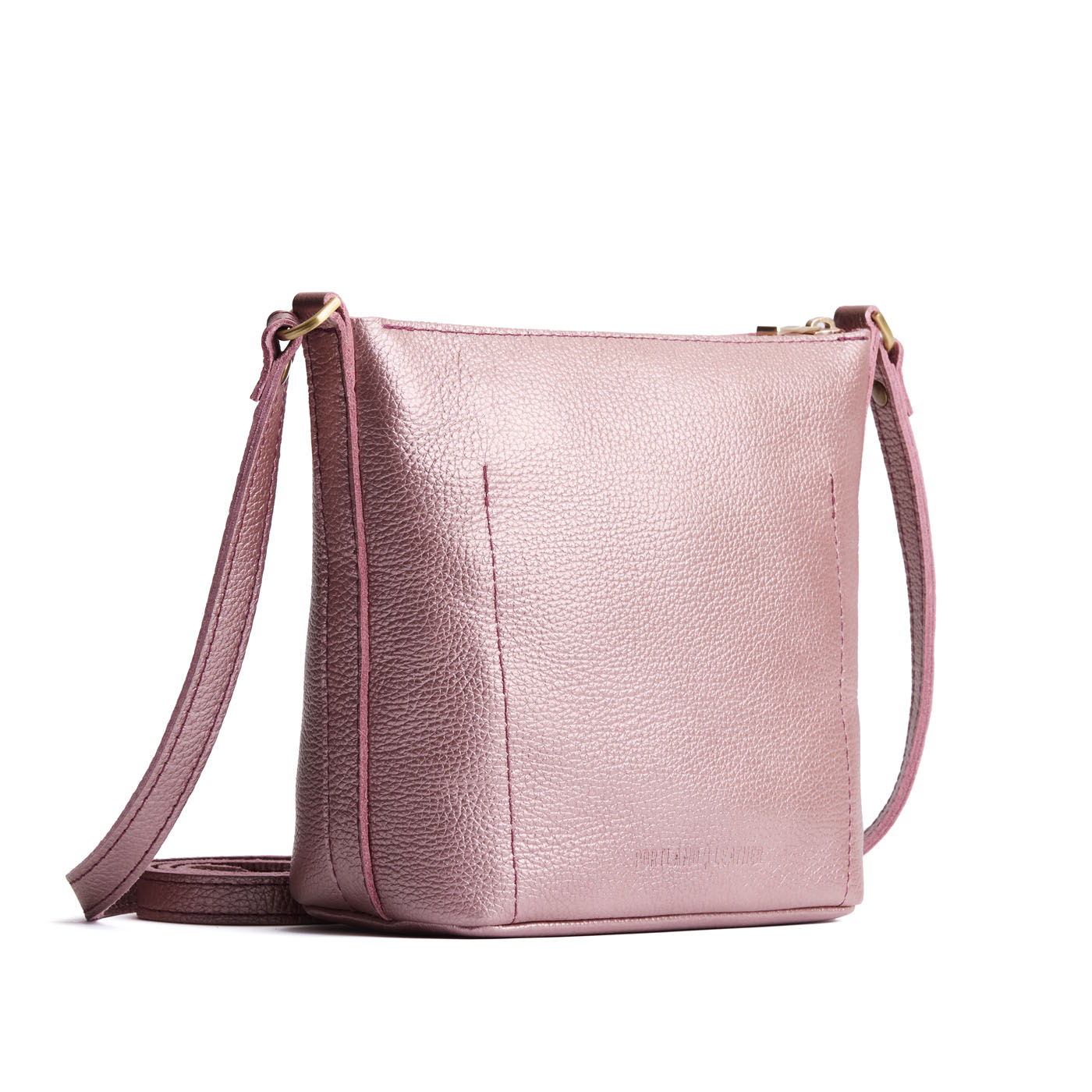 Supernova | Rectangular side bag with curved front pocket and metal tree shaped badge