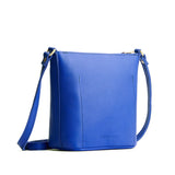 Astro Blue | Rectangular side bag with curved front pocket and metal tree shaped badge