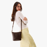 Coldbrew | Model wearing rectangular side bag with curved front pocket and metal tree shaped badge