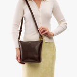 Coldbrew | Model wearing rectangular side bag with curved front pocket and metal tree shaped badge