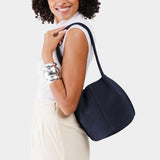 Alaska Blue Classic | Model holding a  leather tote bag 