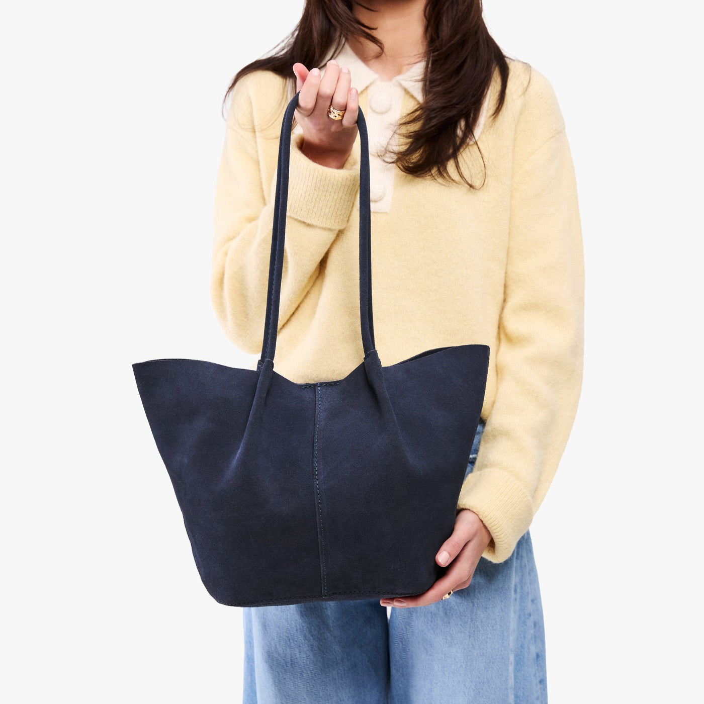 Alaska Blue*Large | Model holding a  leather tote bag 