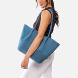 Mariner Blue Oversized | Model holding a  leather tote bag 