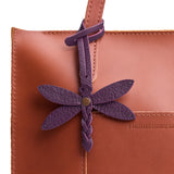 Plum | Dragonfly shaped leather charm tassel on bag 