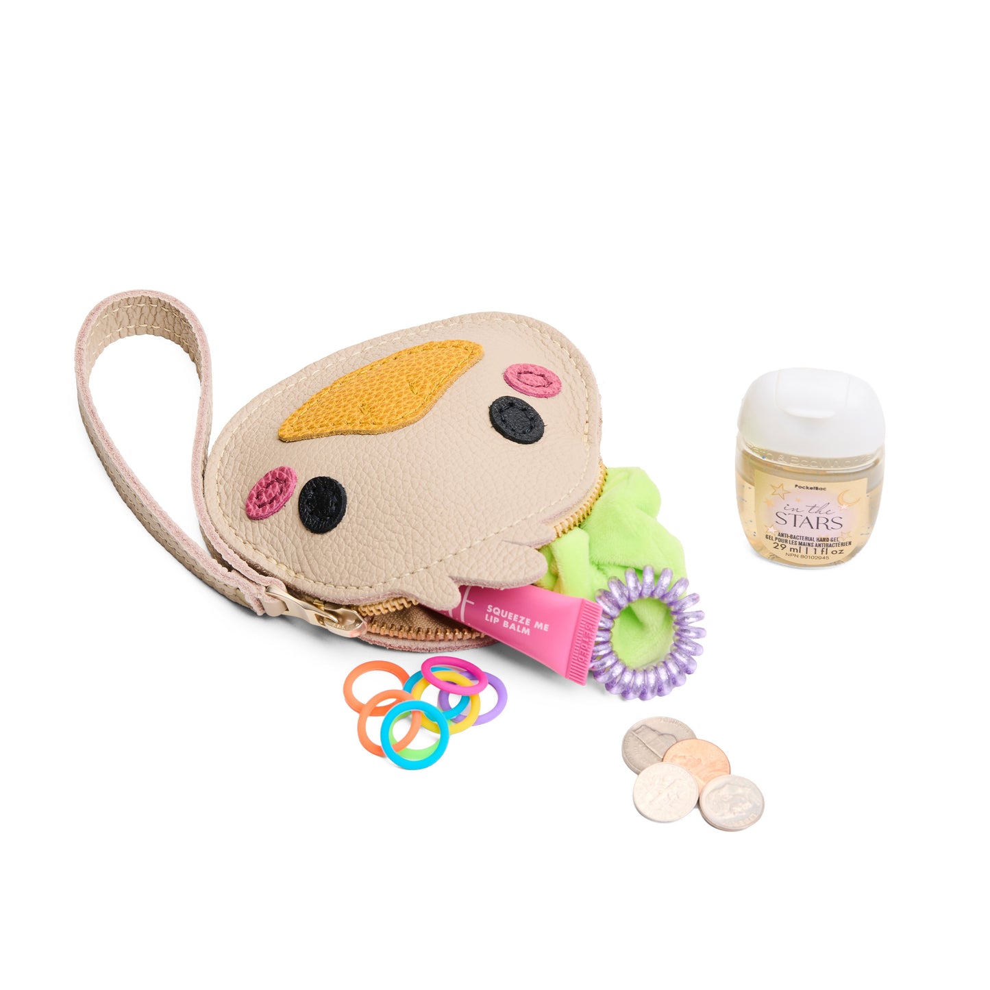 Oatmilk | Duck-shaped pouch with zipper opening, wristlet and products displayed