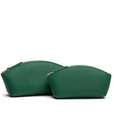 Bacalar | Size comparison shot of two spacious leather makeup bags with curved seams and top zipper