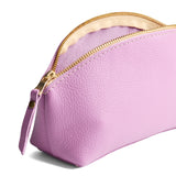 Calla Lily | Spacious leather makeup bag with curved seams and top zipper