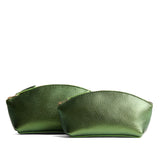Metallic Greench | Spacious leather makeup bag with curved seams and top zipper