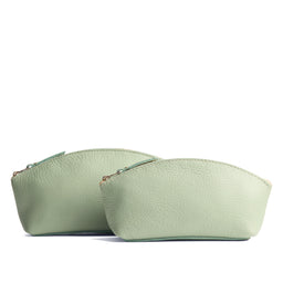 Pistachio | Spacious leather makeup bag with curved seams and top zipper