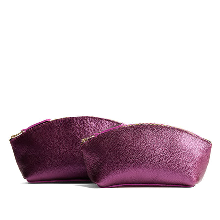 Ultra Violet | Spacious leather makeup bag with curved seams and top zipper