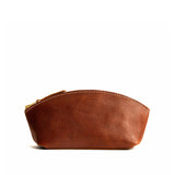 Nutmeg Eclipse | Spacious leather makeup bag with curved seams and top zipper