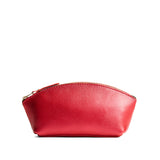 Reba Red Eclipse | Spacious leather makeup bag with curved seams and top zipper