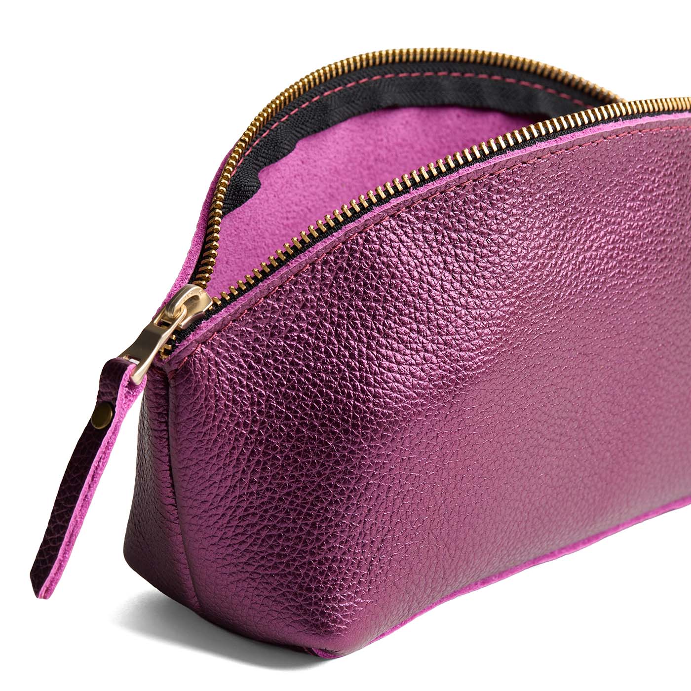 Ultra Violet | Spacious leather makeup bag with curved seams and top zipper