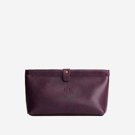 Plum | Leather pouch with frame top closure and leather pull tab